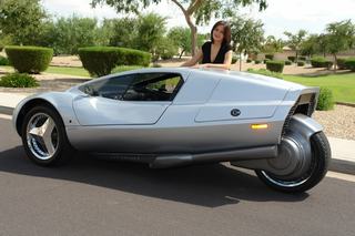 Illustration for article titled 125 MPG Diesel-Electric Three-Wheeled Car Headed For Production